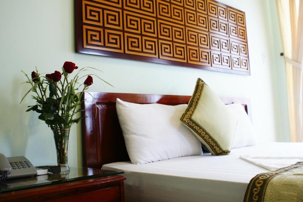 Amigo Hue Hotel Rum bild
